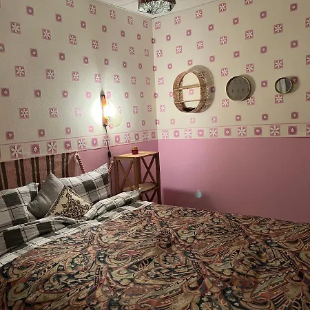 Δωμάτια σε οικογενειακή κατοικία Cosy Puessi Town *