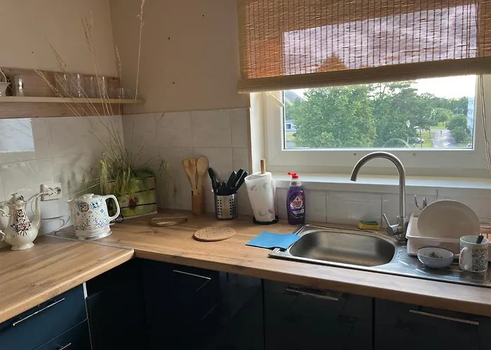 Quarto em Acomodações Particulares Cosy Puessi Town *