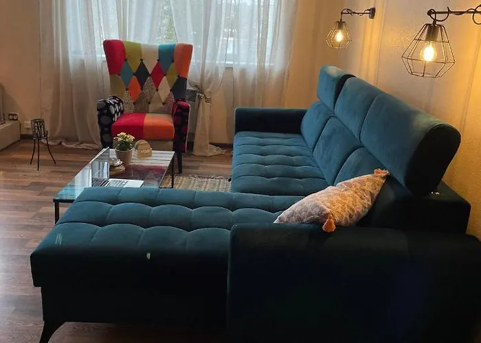 Quarto em Acomodações Particulares Cosy Puessi Town