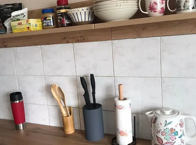 Quarto em Acomodações Particulares Cosy Puessi Town