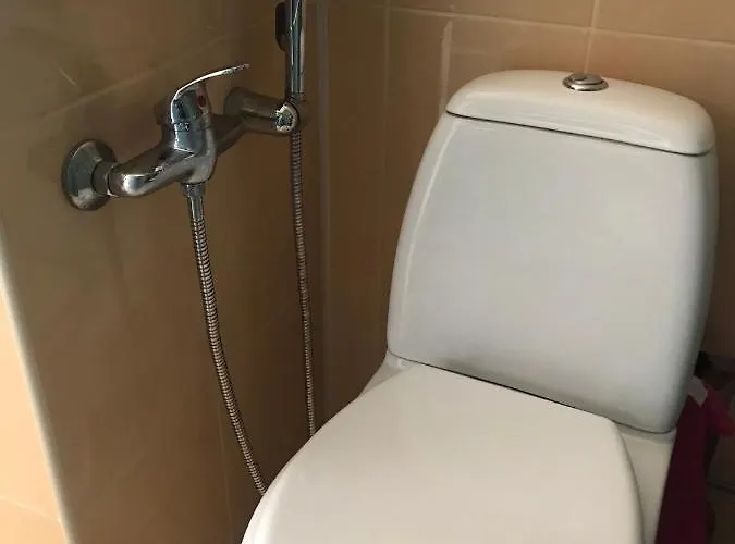 Quarto em Acomodações Particulares Cosy Puessi Town Pussi