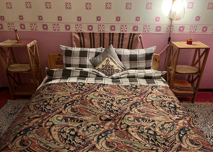 Quarto em Acomodações Particulares Cosy Puessi Town *